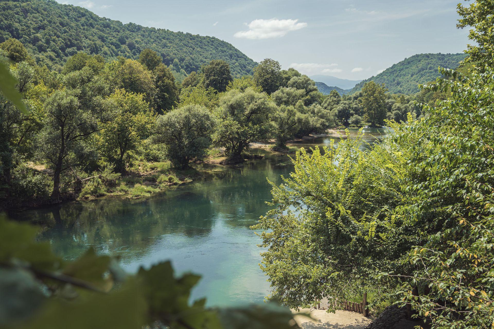 River Una view with green forests around and small waterfall